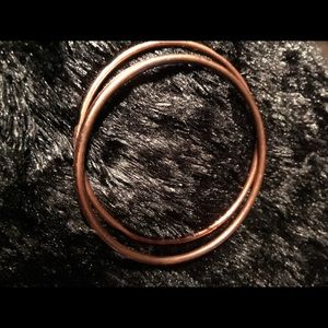 Rose colored bangle bracelet